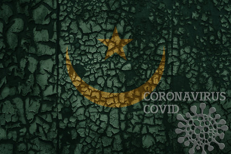 flag of mauritania on a old vintage metal rusty cracked wall with text coronavirus, covid, and virus picture.の写真素材