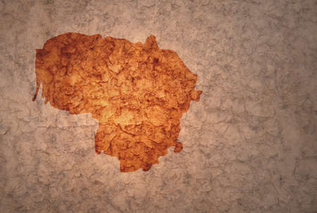 map of lithuania on a old ancient vintage crack paper backgroundの写真素材