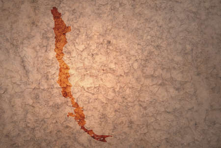 map of chile on a old ancient vintage crack paper backgroundの写真素材
