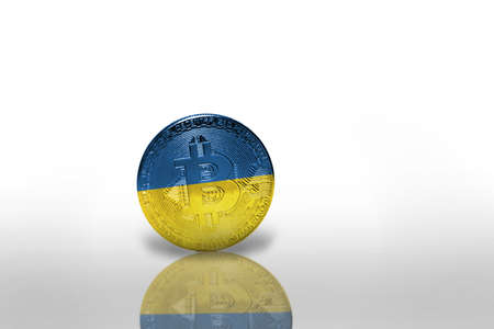 bitcoin with the national flag of ukraine on the white background. bitcoin mining concept. 3d illustrationの写真素材