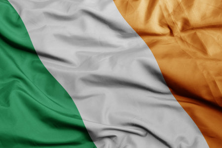 waving colorful national flag of ireland .macro shot. 3D illustrationの写真素材