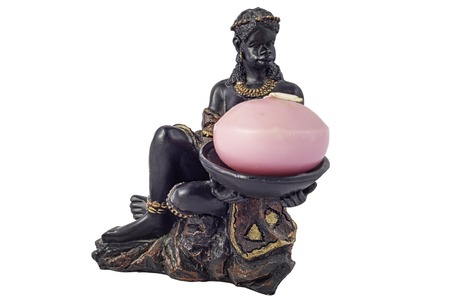 Aboriginal women as a statue with candleの写真素材