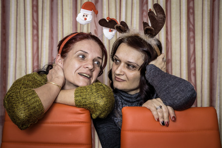 Sisters on Christmas having funの写真素材