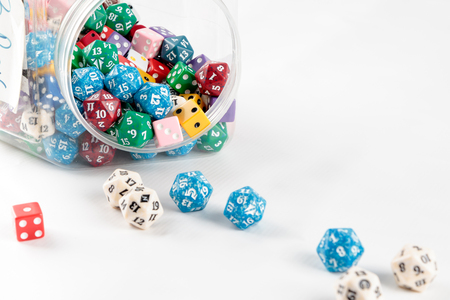 Mixed, colored diceの写真素材