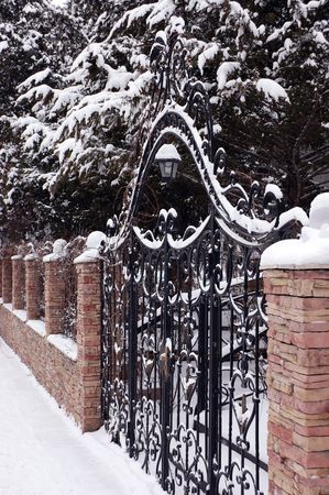 Old Closed gate and fence . Winter .の写真素材