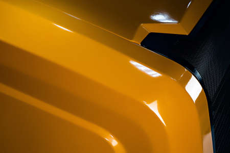 Yellow front panel of a car tractor mechanism machine. Industry technologies, driveの写真素材