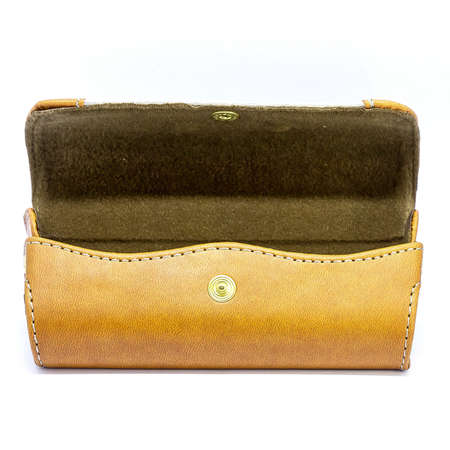 Leather jeans glasses case on white background isolatedの写真素材