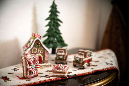 Candlestick Interior Decor with candles, table handmade arrangement mini decoration for new year, artificial Christmas treeの写真素材
