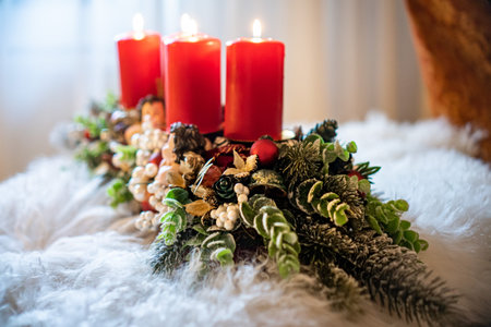 Advent wreath with silver ribbons.