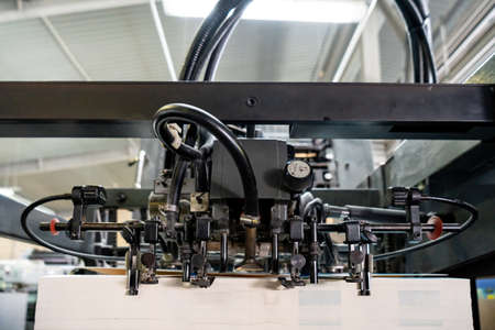 Printing at high speed on offset machine. Label, Rolled Up, Printing Out, Group of Objects Merchandiseの写真素材