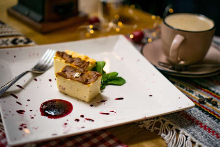 Traditional Georgian sweets and desserts with hazelnuts, walnuts, grape juice, honey, chocolate. Baklava, nakhini, Fresh fruits and candied fruits. Traditional Turkish coffee.の写真素材