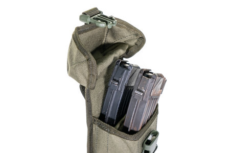 A bag containing magazines on a white background. bag for magazine firearms Pouch version with tubular magazine. Pistol wallet.の写真素材