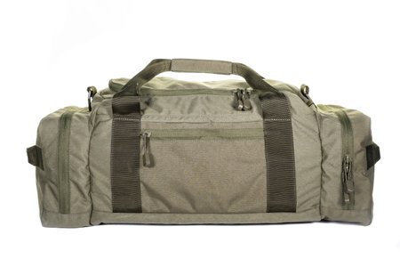 Military style bag. Isolated on white. Canvas Backpack Front View of Modern Waterproof Camping Traveler Back Pack Bag with Shoulder Straps and Haul Loop Tactical Hiking Travel Travelの写真素材