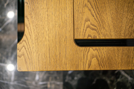Empty rough wooden table top in dark room