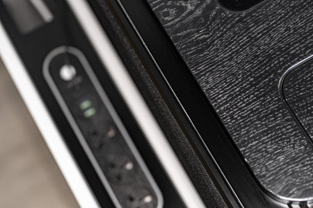 Mobile phone with wireless charger table. Modern workplace accessoryの写真素材
