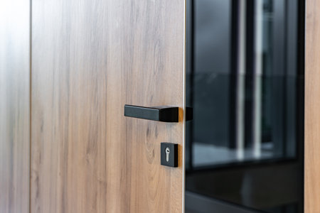 Wooden door with a glass reflection background.の写真素材
