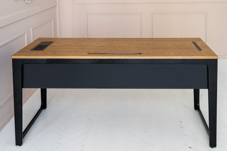 Director's office with large wooden table. Interior loft design