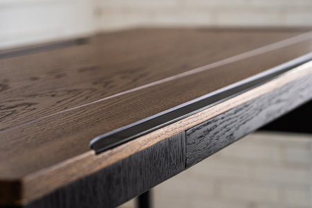 Mobile phone with wireless charger table. Modern workplace accessoryの写真素材