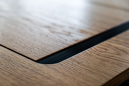 Mobile phone with wireless charger table. Modern workplace accessoryの写真素材