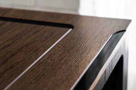 Mobile phone with wireless charger table. Modern workplace accessoryの写真素材