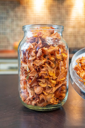 dry fruits in glass can - apple pear almond pistachio raisin cashew and walnut blurry picture...
