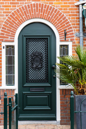 Typical Dutch door. Dutch holland architectural detail, a door in Netherlands city. Dutch doorの写真素材