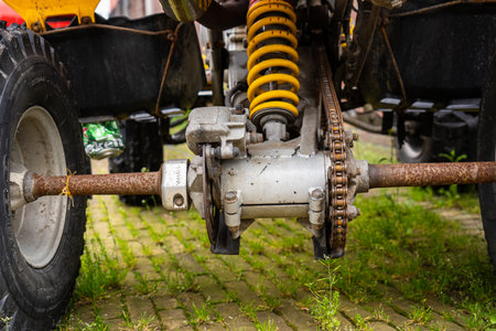 Yellow quadbike at the city street.の写真素材
