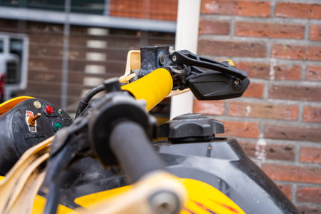 Yellow quadbike at the city street.の写真素材
