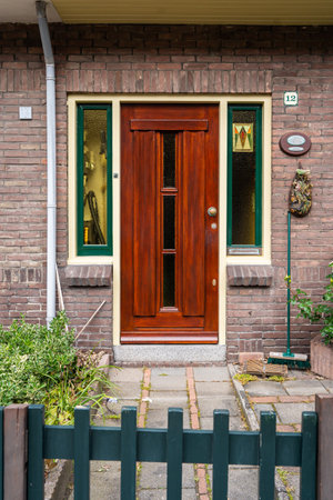 Typical Dutch door. Dutch holland architectural detail, a door in Netherlands city. Dutch doorの写真素材