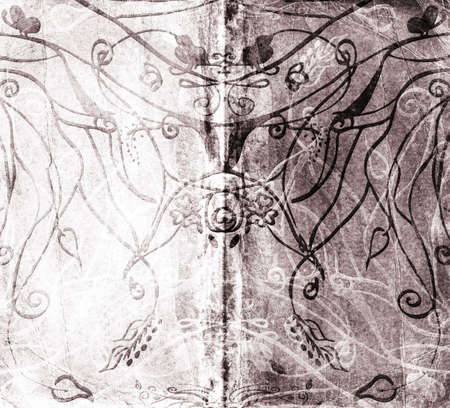 book spread with complex swirl designsの写真素材