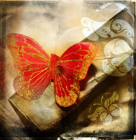 grunge illustration of red butterfly on textured backgroundの写真素材
