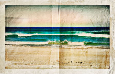 grunge old-fashioned sea postcard with blue wavesの写真素材