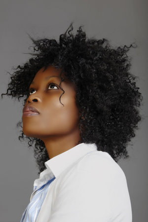 South African business woman with long curly afro.