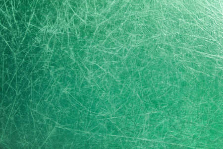 metallic textured green background with empty spaceの写真素材