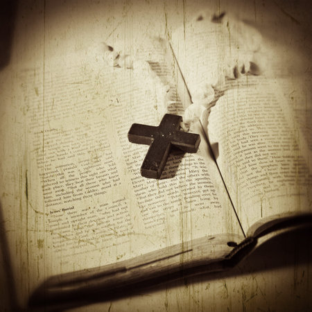 Open Bible with a cross