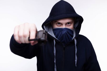 Armed robbers used the gun to robbery the money, Uses Gun in Armed Robbery, Armed robbers.の写真素材