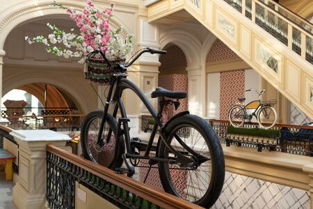 Bike in shopping center. bicycle with flowers.の写真素材