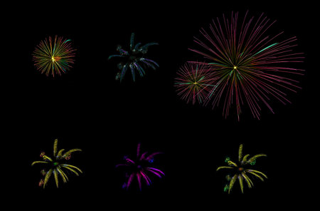 multicolored, clear fireworks on a black background isolated