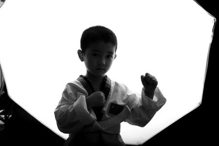 Black and white photo of a boy in a white kimonoの写真素材