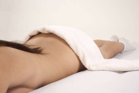 Attractive woman spa treatment isolated on whiteの写真素材