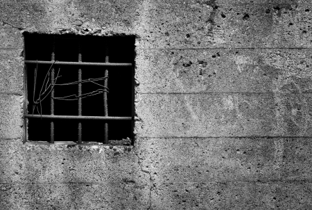 old barred windowの写真素材