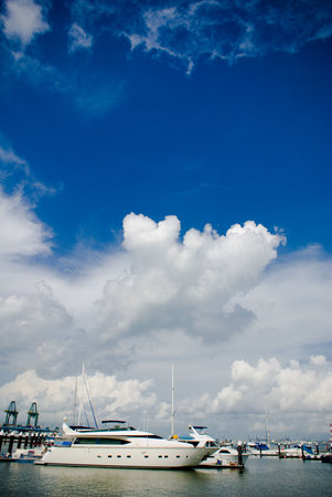 Beautiful habor view wth blue sky and luxury yacht in tropical countryの写真素材