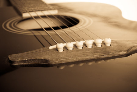 Close up observation of antique classic wooden guitar