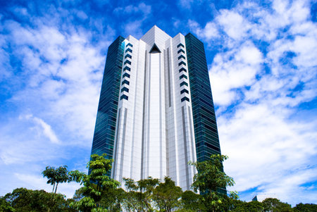 Modern single commercial building against blue sky