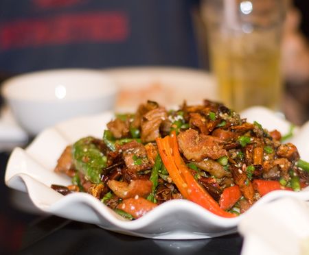 delicious chinese food in white plate restaurantの写真素材