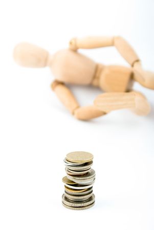 dummy with southeast country coins isolated on whiteの写真素材