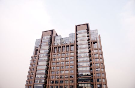 reflections on modern office building in Beijing, Chinaの写真素材