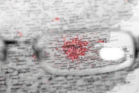 destination searching through eye glass with frameの写真素材