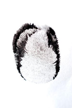 detail of black fingerprint isolated on whiteの写真素材