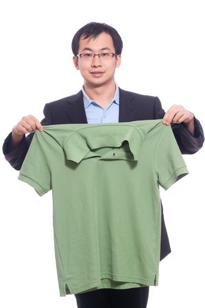 Asian young male business man neaten his polo shirtの写真素材